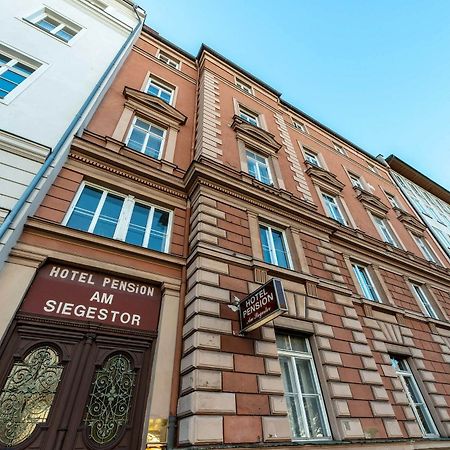 Hotel-Pension Am Siegestor Munique Exterior foto